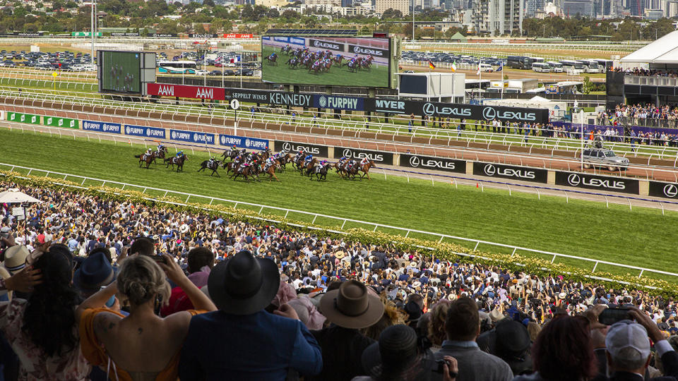 Racing fans, pictured here in attendance at the Melbourne Cup in 2019.