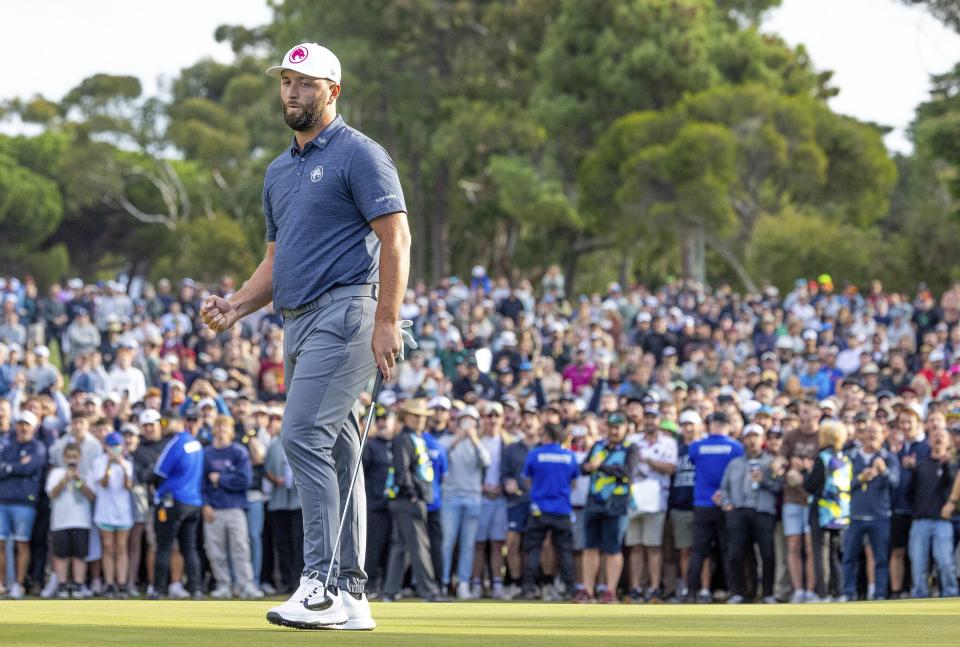 Captain Jon Rahm of Legion XIII reacts to his putt on the 18th green during the first round of LIV Golf Adelaide at the Grange Golf Club Friday, April 26, 2024, in Adelaide, Australia. (Chris Trotman/LIV Golf via AP)