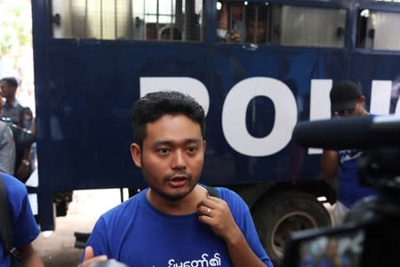 FILE PHOTO: Youth activist Maung Saung Kha talks to the press at Insein court in Yangon