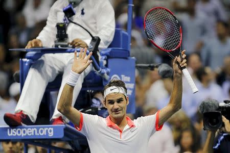 Switzerland's Roger Federer celebrates his victory over France's Richard Gasquet in their quarterfinals match at the U.S. Open Championships tennis tournament in New York September 9, 2015. REUTERS/Eduardo Munoz