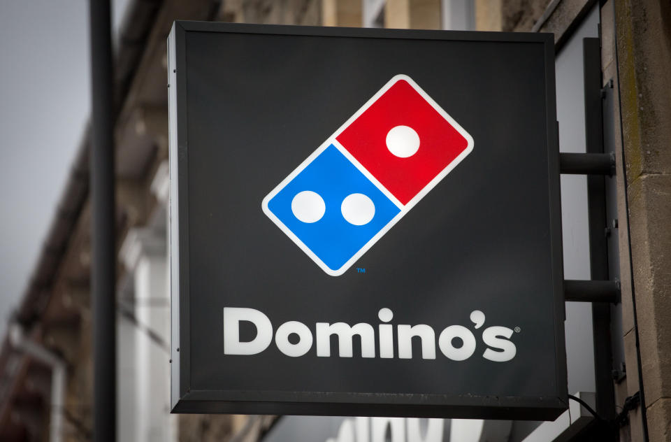 BATH, ENGLAND - FEBRUARY 19:  A branch of Domino's pizza takeaway is pictured on February 19, 2018 in Bath, England. The number of takeaway restaurants has increased significantly in the last few years and this has raised concerns that this can lead to over-consumption in cheap, unhealthy high-fat nutrient-poor food and drink leading to higher body weight and greater risk of obesity.  (Photo by Matt Cardy/Getty Images)