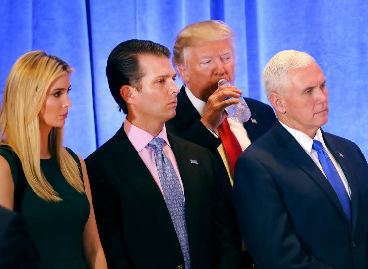 Ivanka Trump, left, with her brother, Donald Trump Jr., father, and Vice President-elect Mike Pence during Wednesday's press conference. (Photo: Getty Images)