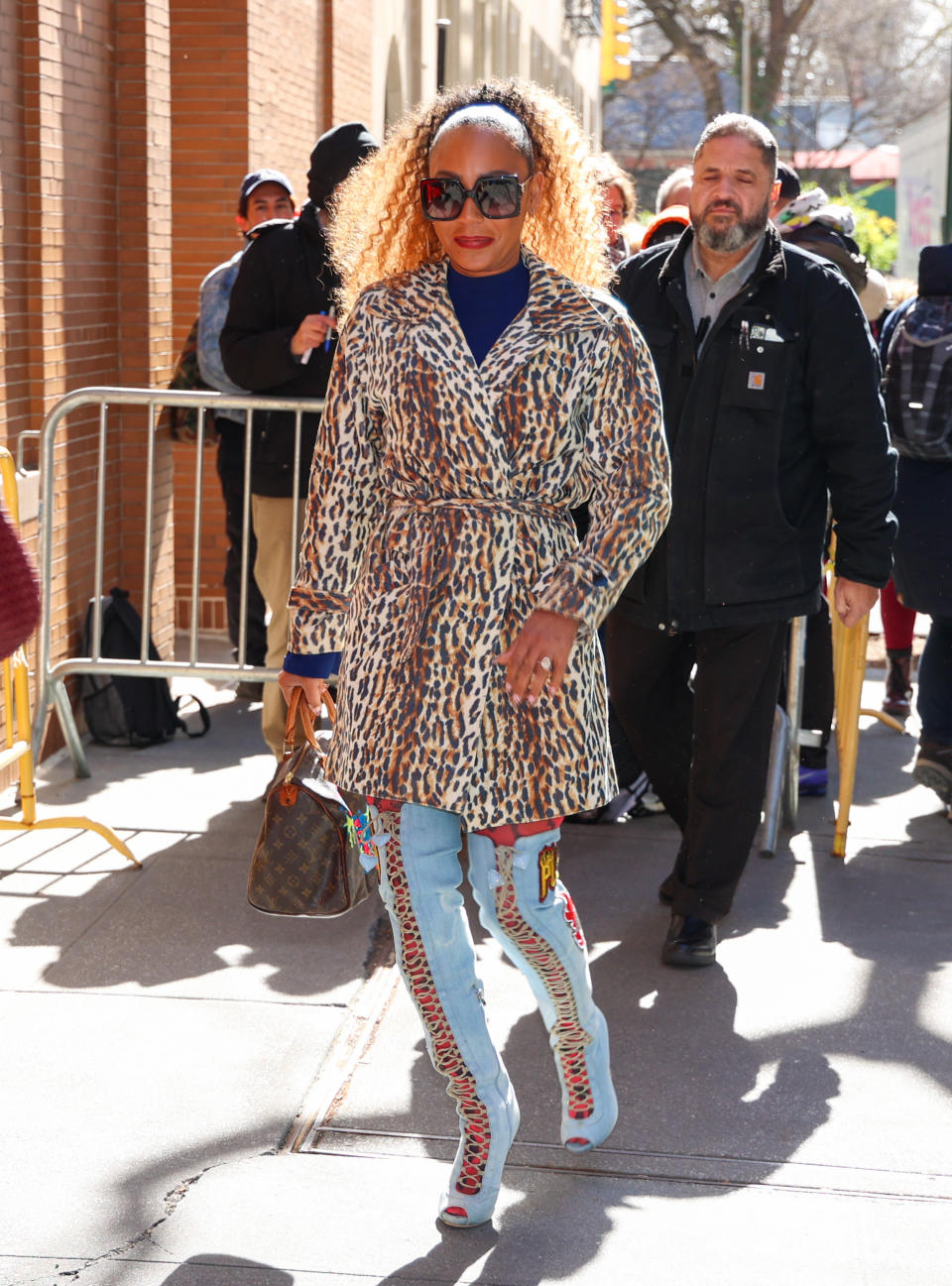 Mel B is seen arriving to her interview with "The View" in blue Philipp Plein heels