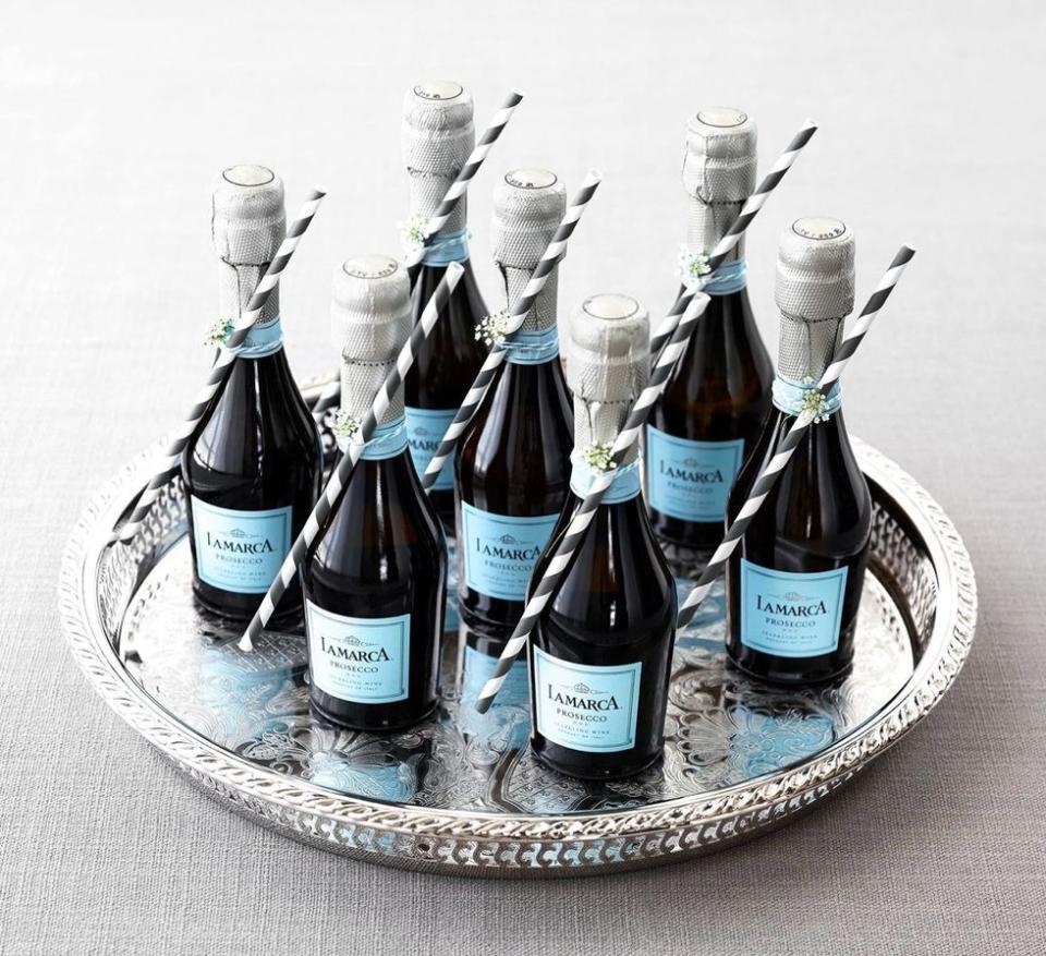 <p>Ditch the big bottles of champagne for personal mini ones. This way, people won’t have to wait in line for long and can craft their drink at their table instead. Plus, you can attach cute paper straws to them and labels if the brunch is for a wedding, baby shower, or any other celebration.</p>