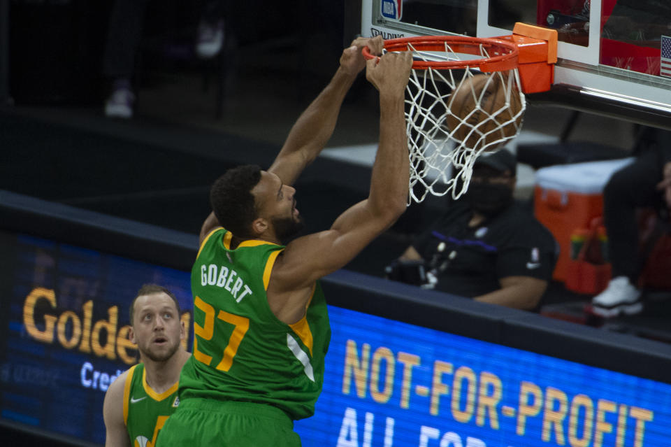 Utah Jazz center Rudy Gobert (27) dunks the ball against the Sacramento Kings during the first quarter of an NBA basketball game in Sacramento, Calif., Sunday, May 16, 2021. (AP Photo/Randall Benton)