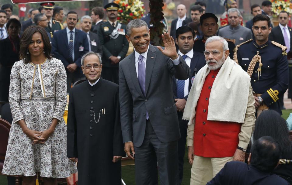 U.S. President Obama and first lady Obama pose with India's President Mukherjee and Prime Minister Modi during a home reception at Rashtrapati Bhavan presidential palace in New Delhi