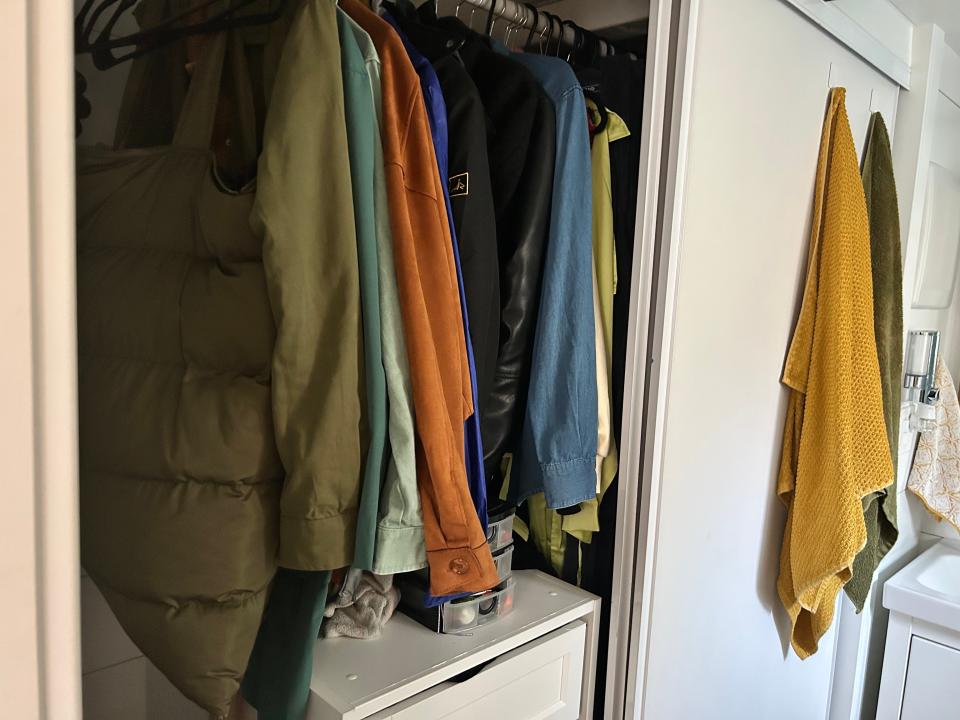 view inside closet with clothes hanging