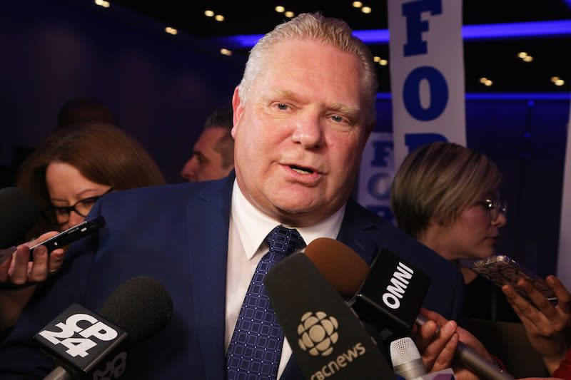 Doug Ford is seen here speaking to the media in Toronto in February. The Ontario PC leader’s campaign team says they won’t have a media bus for the upcoming provincial election campaign. Photo from Getty Images.