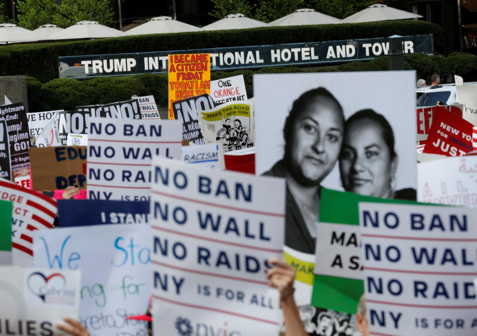 <p>People march and chant slogans against President Trump’s proposed end of the DACA program that protects immigrant children from deportation at a protest in front of Trump International Hotel in New York City, Aug. 30, 2017. (Photo: Joe Penney/Reuters) </p>