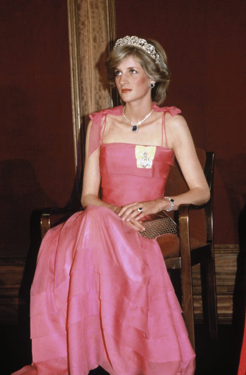 BRISBANE, AUSTRALIA - APRIL 11: Diana, Princess of Wales, wearing a pink dress designed by Victor Edelstein, the Spencer family tiara and diamond and sapphire jewels given to her by the Crown Prince of Saudi Arabia, attends a state reception at the Crest International Hotel on April 11, 1983 in Brisbane, Australia. (Photo by Anwar Hussein/WireImage)