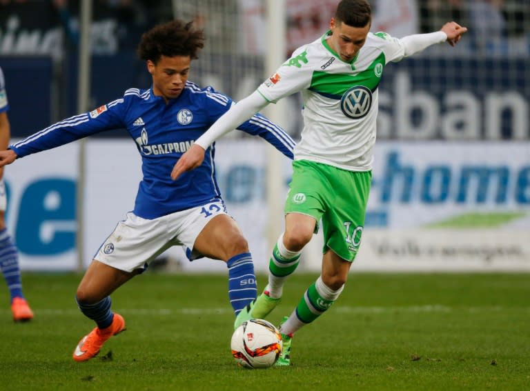 Wolfsburg's Julian Draxler (right) outsmarts Schalke's Leroy Sane in a Bundesliga game in Gelsenkirchen on February 6, 2016