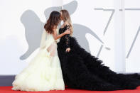 VENICE, ITALY - SEPTEMBER 09: Mila Suarez and Elisa De Panicis share a kiss as they walk the red carpet ahead of the movie "Le Sorelle Macaluso" at the 77th Venice Film Festival on September 09, 2020 in Venice, Italy. (Photo by Vittorio Zunino Celotto/Getty Images)
