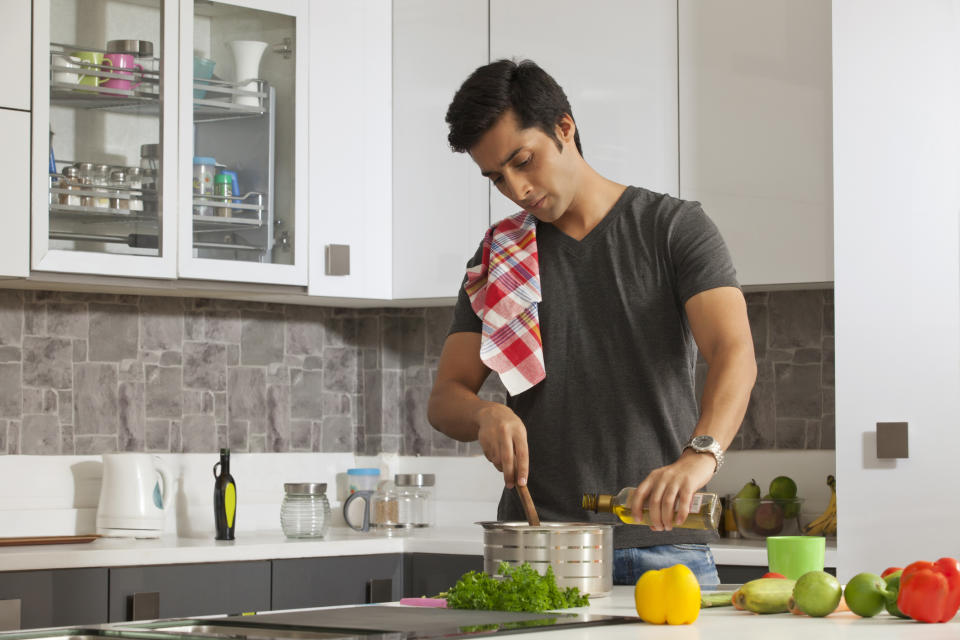 A man cooking in the kitchen