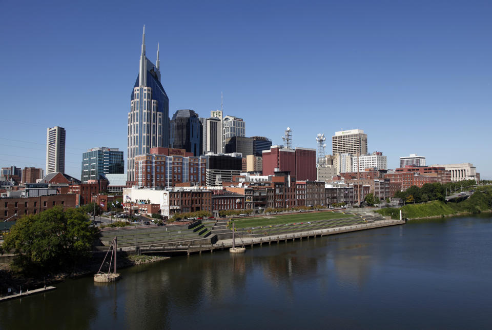 FILE - The downtown area of Nashville, Tenn., and the Cumberland River are shown on Sept. 27, 2011. Republicans are deciding whether to nominate their 2024 presidential candidate in Milwaukee, the largest Democratic stronghold in battleground Wisconsin, or in Nashville, a blue city in a deep red state. (AP Photo/Mark Humphrey, File)