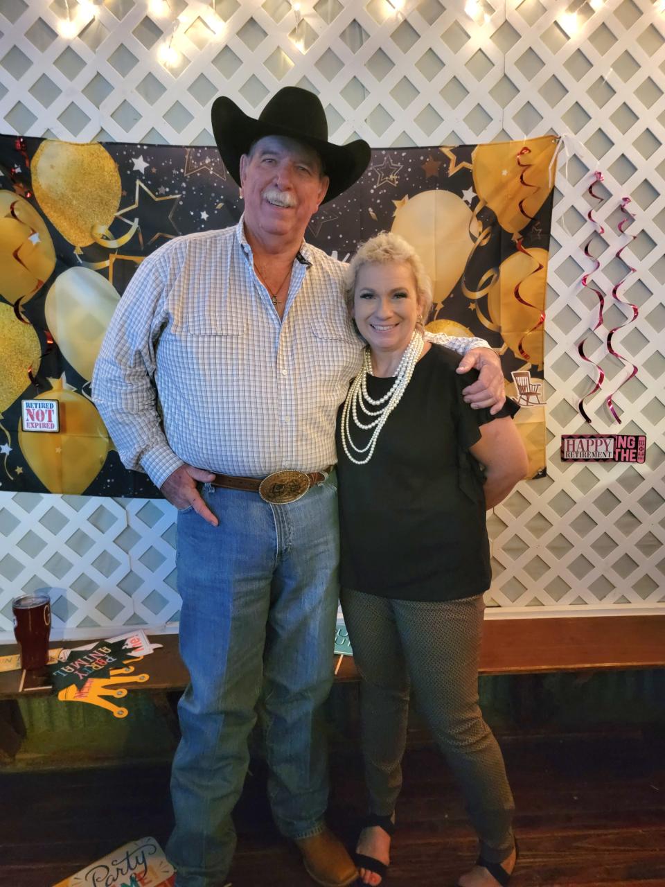 George Wayne Meuth (left) and Melissa Voigt (right) marked their recent retirement with a combined celebration at Watterson Hall on Jan. 8.