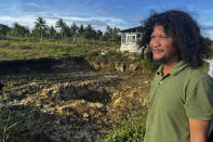 Joel Diccion, a farmer, poses for a photo in Carmen, Philippines, May 6, 2024. A growing type of insurance, called parametric insurance, is helping farmers like Diccion and others in developing countries respond to extreme weather events. (Bill Spindle/Cipher News via AP)