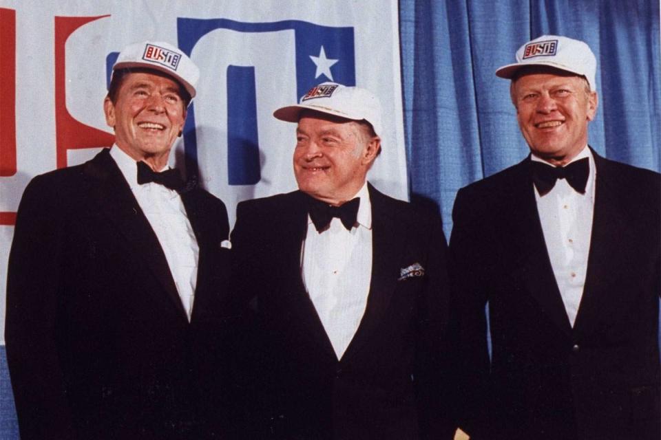 <p>Ronald Reagan, actor Bob Hope and Gerald Ford pose during the USO's 40th Anniversary dinner dance at the Washington Hilton hotel.</p>