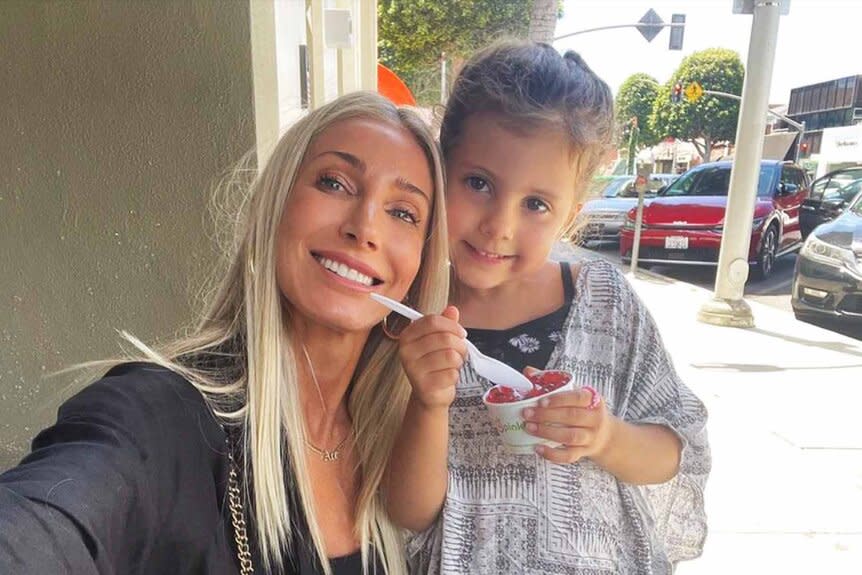 Heather Altman smiles with daughter Lexi in a selfie