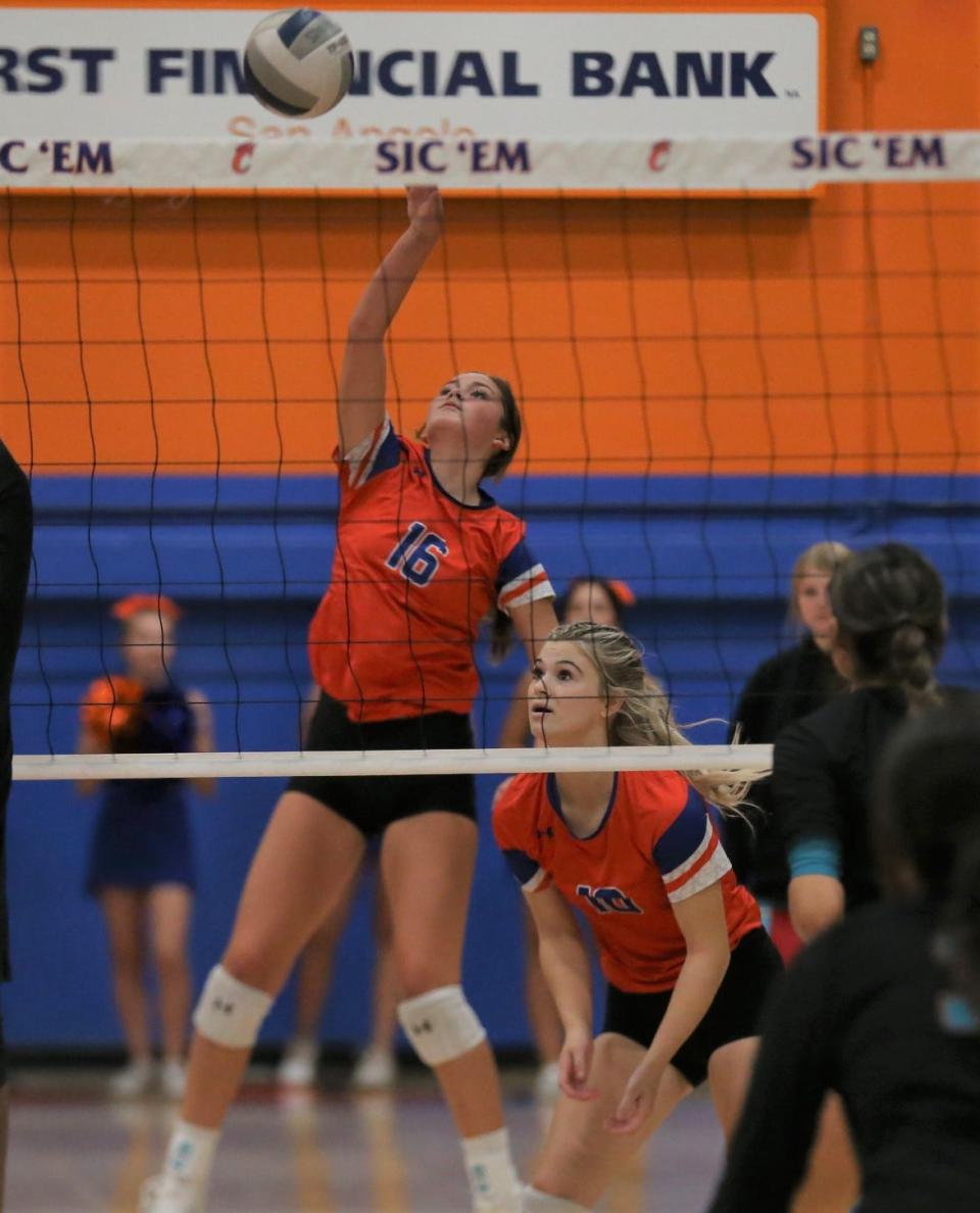 San Angelo Central High School's Emilee Sikora, 16, goes for a kill against El Paso Pebble Hills in the Gold Division championship of the Nita Vannoy Memorial Volleyball Tournament at Babe Didrikson gym on Saturday, Aug. 20, 2022. Teammate Laynee Crooks keeps an eye on the play.