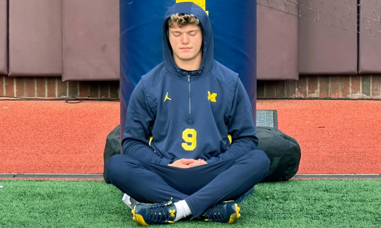 <span>JJ McCarthy is known for meditating before games. </span><span>Photograph: Larry Lage/AP</span>