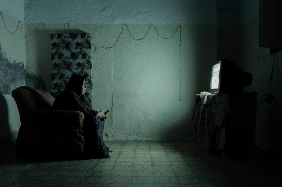 Sobhia lives among the alleyways of Al-Shati refugee camp in a ground-floor flat. ‘In my senior years with decreased mobility, the TV has become my best friend, it’s all I have to look forward to’ (Paddy Dowling)