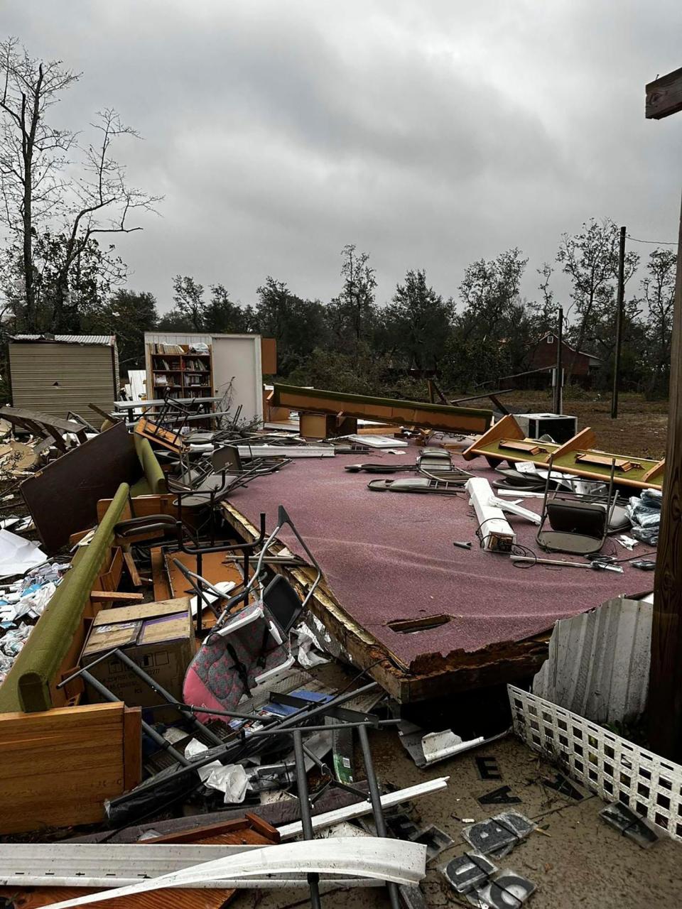 This photo provided by Bay County Sheriff's Office shows storm damage around around Panama City Beach, Fla., in Bay County, early Tuesday, Jan. 9, 2024. A sprawling storm has hit the South with strong thunderstorms and tornado warnings that blew roofs off homes and tossed about furniture in the Florida Panhandle and brought cities across the Midwest to a standstill with more than half of foot of snow. (Bay County Sheriff's Office via AP)