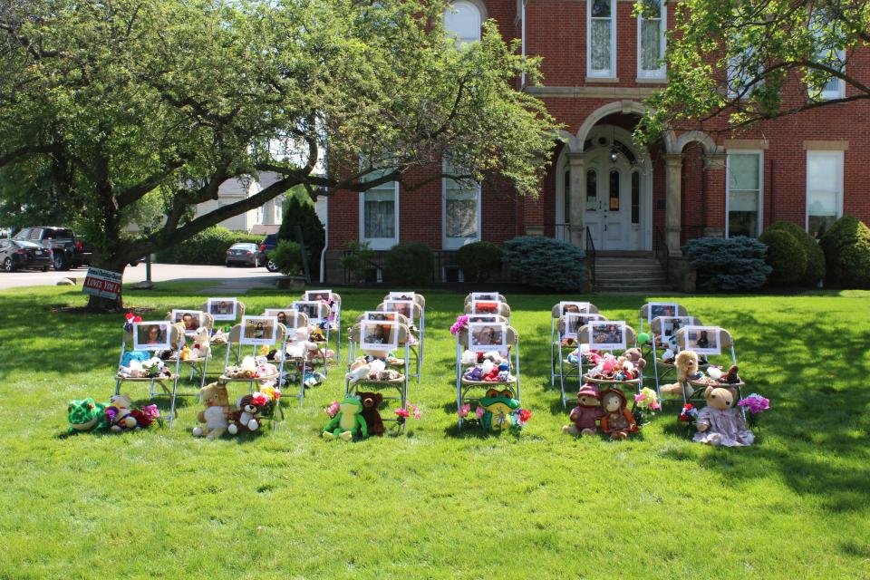 At Central Christian Church, 21 chairs line the front lawn to memorialize the 19 students and two teachers who died in the shooting at Robb Elementary School in Uvalde, Texas.