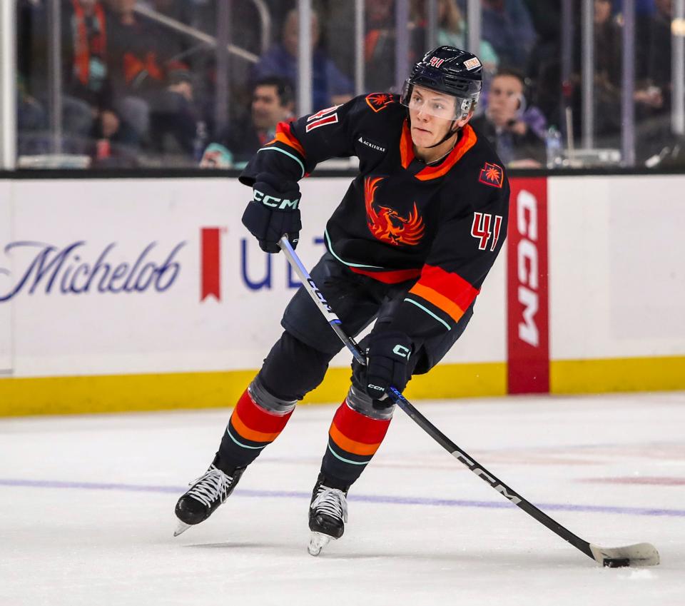 Coachella Valley defenseman Ryker Evans (41) looks for a shot during the first period of their game at Acrisure Arena in Palm Desert, Calif., Saturday, Jan. 6, 2024.