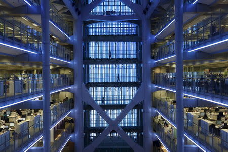 Staff walk inside the HSBC headquarters in Hong Kong in this November 3, 2015 file photo. REUTERS/Bobby Yip/Files