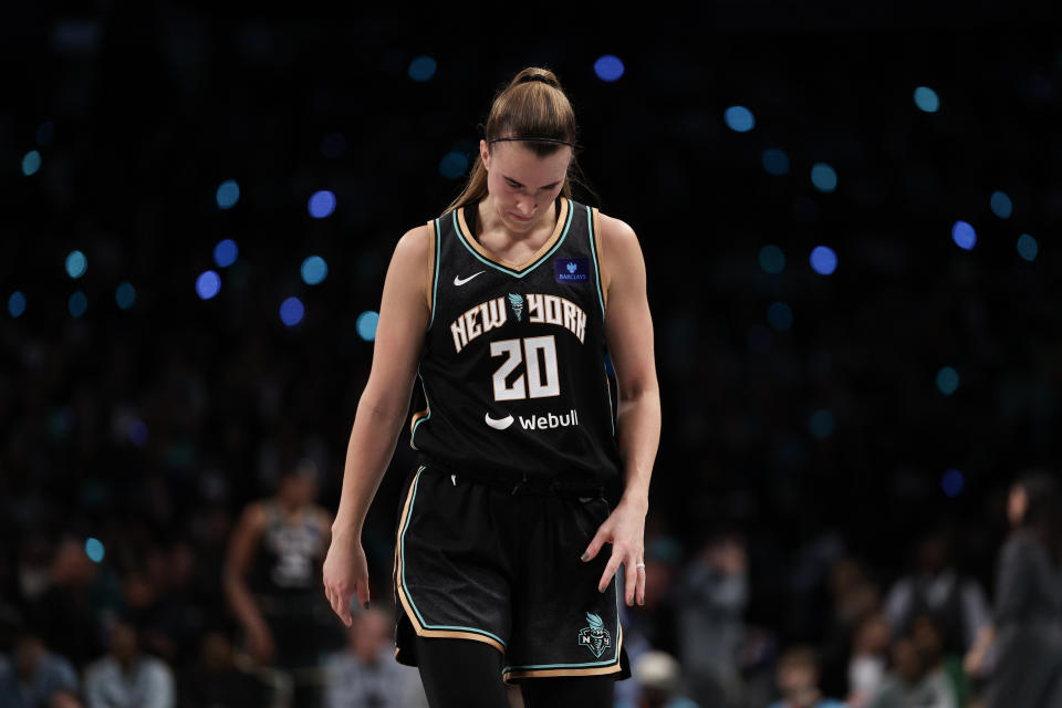 NEW YORK, NEW YORK - OCTOBER 10: Sabrina Ionescu #20 of the New York Liberty reacts during the second half against the Minnesota Lynx during Game One of the WNBA Finals at the Barclays Center on October 10, 2024 in New York City. (Photo by Elsa/Getty Images)