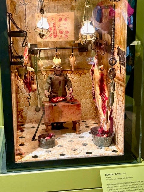 The 2015 "Butcher Shop" diorama by Jamie Wyeth is one of the more than works in his exhibition "Jamie Wyeth: Unsettled" that opened March 17, 2024, at the Brandywine Museum of Art in Chadds Ford. It depicts a grime-faced butcher in a scene similar to a horror movie.