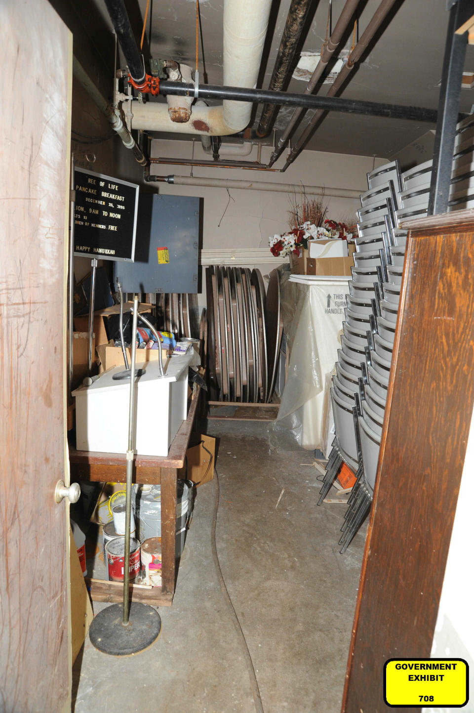 This photo of a storeroom in the Tree of Life synagogue building in Pittsburgh was entered May 31, 2023, as a court exhibit by prosecutors in the federal trial of Robert Bowers. He faces multiple charges in the killing of 11 worshippers from three congregations and the wounding of seven worshippers and police officers in the building on Oct. 27, 2018. New Light Congregation members Carol Black and Barry Werber sheltered in this closet for what "felt like a year" before police rescued them, Black testified. Three of the victims were members of New Light -- Dan Stein, Melvin Wax and Black's brother, Richard Gottfried. The charges include the obstruction of the free exercise of religion, resulting in death. (U.S. District Court for the Western District of Pennsylvania via AP)