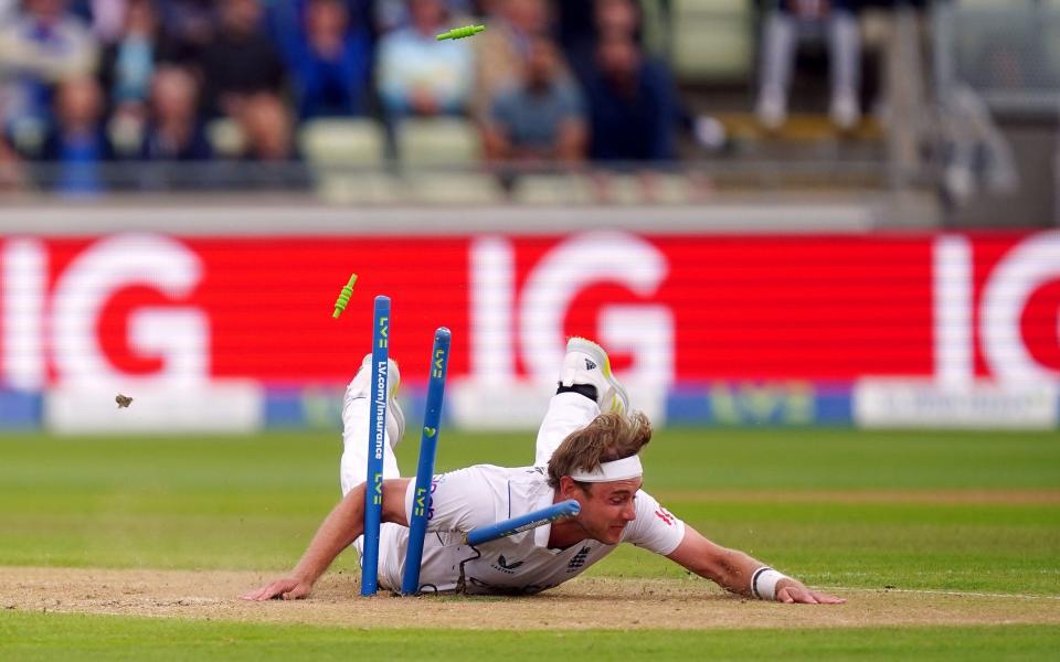 Stuart Broad despairingly attempts a run-out - PA