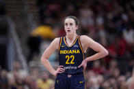 Indiana Fever guard Caitlin Clark (22) stands on the court in the second half of a WNBA basketball game against the New York Liberty, Thursday, May 16, 2024, in Indianapolis. (AP Photo/Michael Conroy)