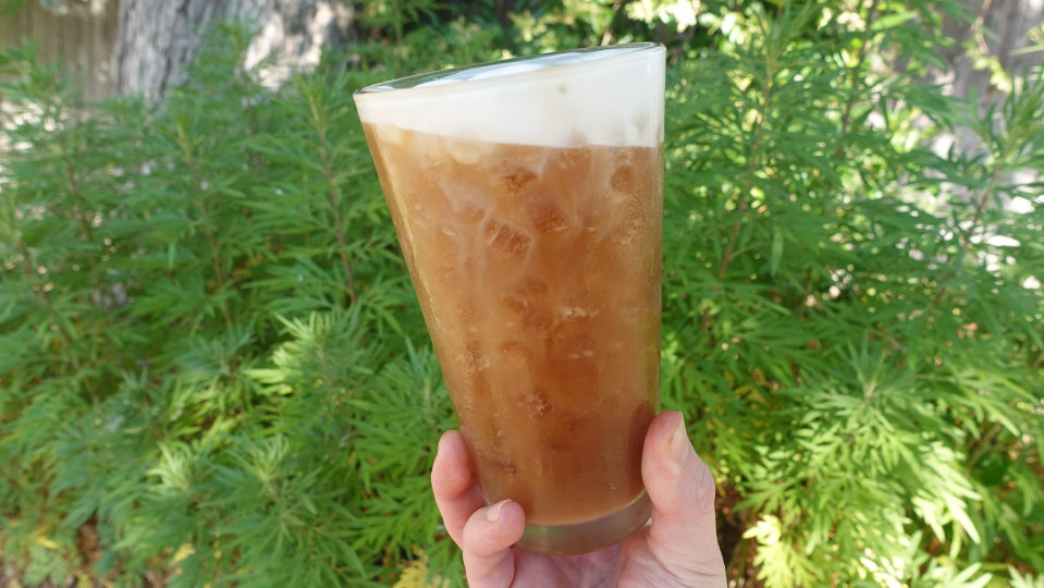 A delicious glass of nitro cold brew coffee on a warm summer day.