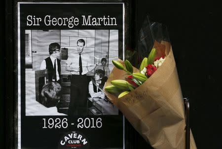 A floral tribute in memory of music producer George Martin is left outside the Cavern Club in Liverpool, Britain March 9 , 2016. REUTERS/Phil Noble