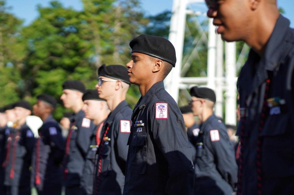 Cadet Kaleb Jones stands at attention with the rest of his platoon outside of the Michigan Youth Challenge Academy in Battle Creek on Saturday, June 15, 2024.