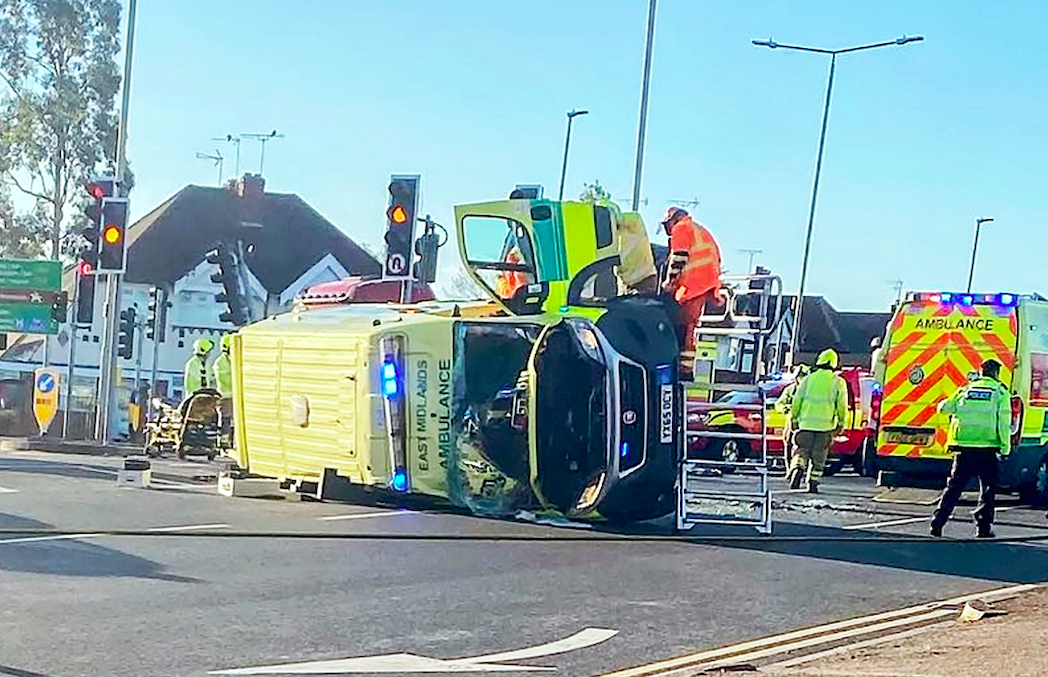 An ambulance transporting a patient on an emergency call overturned during a crash in Leicester. (SWNS)