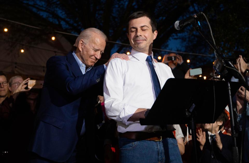 Former mayor and presidential candidate Pete Buttigieg, shown here last March with now President-elect Joe Biden, has been put forth by the president-elect as the nation's next transportation secretary. Biden hopes to allocate more than $1 trillion to the nation's infrastructure, which would include public transportation — considered a key component in the revitalization of cities post-COVID-19.