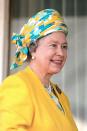 <p> The late Queen's favourite tipple might have been something more classic, but in this exotic headwrap, we can just picture Her Majesty sipping a Pina Colada. She wore this while boarding the Royal Yacht at Portsmouth in 1996. </p>