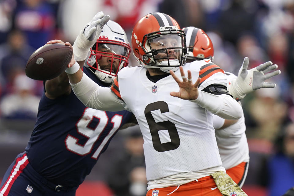 New England Patriots defensive end Deatrich Wise (91) pounces on Cleveland Browns quarterback Baker Mayfield (6) during the first half of an NFL football game, Sunday, Nov. 14, 2021, in Foxborough, Mass. (AP Photo/Steven Senne)