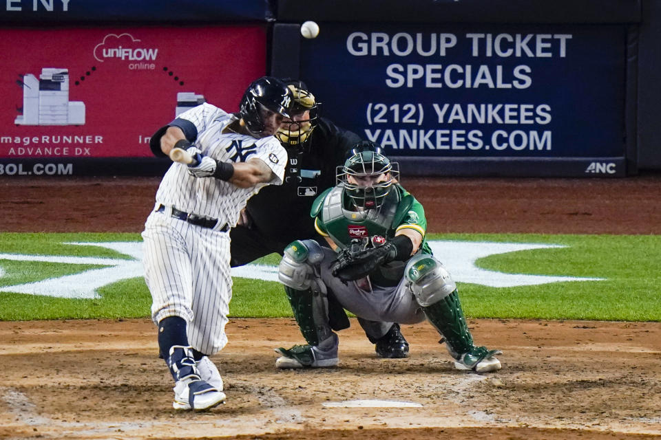 New York Yankees' Rougned Odor hits a home run during the fifth inning of the team's baseball game against the Oakland Athletics on Friday, June 18, 2021, in New York. (AP Photo/Frank Franklin II)