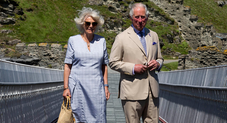 The Duke and Duchess of Cornwall attend a ribbon cutting ceremony at the new Tintagel bridge in Cornwall, England, on 20 July.  (Getty Images)