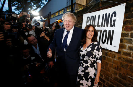 FILE PHOTO: Former London Mayor Boris Johnson and his wife Marina Wheeler arrive to vote in the EU referendum, at a polling station in north London, Britain June 23, 2016. REUTERS/Peter Nicholls/File Photo