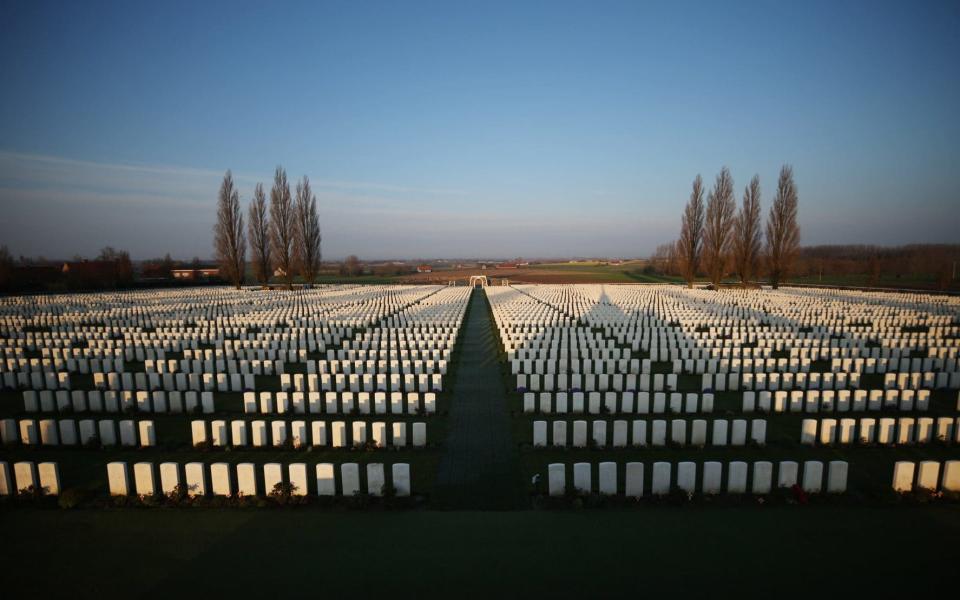 Early morning sunlight at Tyne Cot Commonwealth War Graves Commission cemetery 