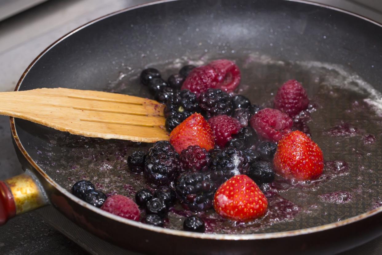 berries cooking in a pan