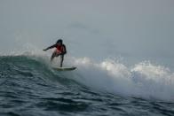 Wider Image: Meet Senegal's first female pro surfer inspiring girls to take to the waves