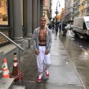 <p>While everyone else was hiding under an umbrella on a rainy NYC day, the Biebs decided to flash his abs. (Photo: <a rel="nofollow noopener" href="https://www.instagram.com/p/BUcol8PjzEH/" target="_blank" data-ylk="slk:Justin Bieber via Instagram;elm:context_link;itc:0;sec:content-canvas" class="link ">Justin Bieber via Instagram</a>) </p>