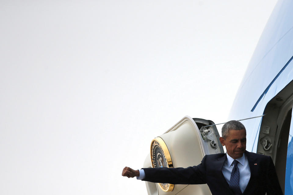 <p>President Obama boards Air Force One to travel to Orlando, Fla., June 16, 2016. The president and vice president will meet with families of victims of the Pulse nightclub shooting. (Carlos Barria/Reuters) </p>