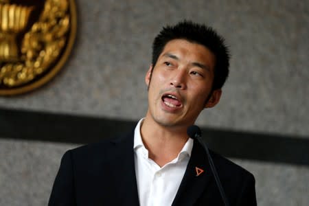 Thanathorn Juangroongruangkit, leader of the Future Forward Party, speaks during a news conference at the parliament in Bangkok